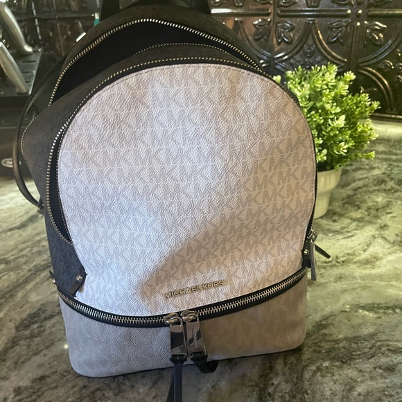 KORS Michael Kors Handbags - Michael Kors black and white backpack, less than 9 months old in new condition